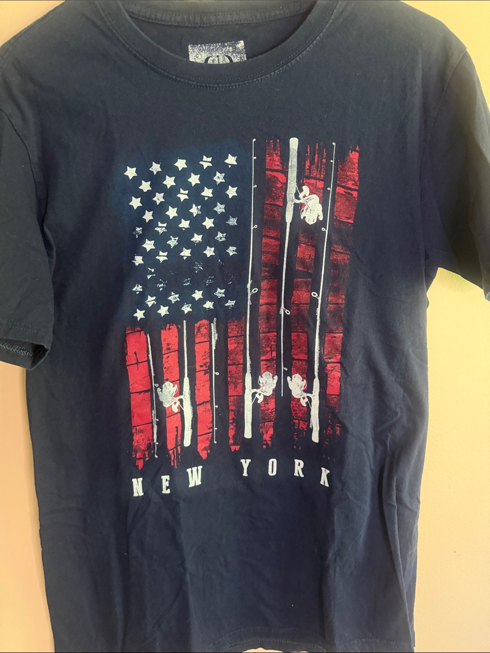 Robin Ruth Black Tee with Red & White New York Flag Graphic